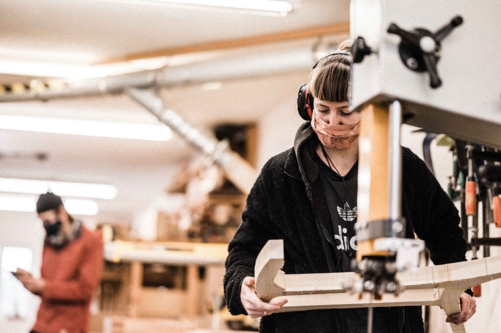 A ROWDEN STUDENT WORKING ON A FURNITURE COMPONENT AS PART OF A FINE FURNITURE MAKING COURSE AT ROWDEN ATELIER