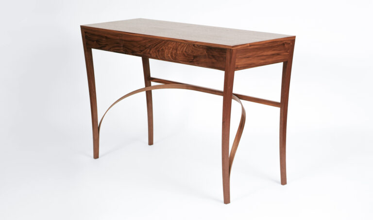 A sideboard table in walnut with laminated underframe, made at Rowden Atelier on a woodworking course