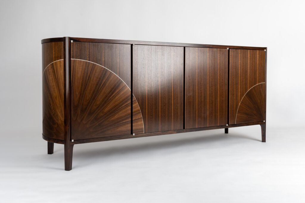 A veneered cabinet in smoked eucalyptus, with sunburst and solid silver stringline, made by a student on a furniture design course at Rowden Atelier