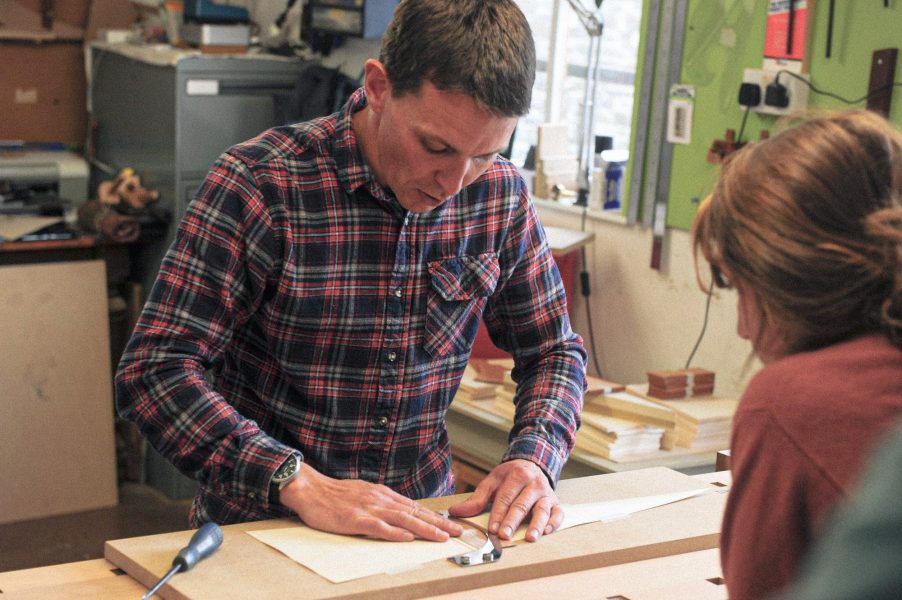 tutor at Rowden Atelier, Daren Millman showing a student part of the process in sunburst veneering as part of a woodworking course at Rowden Atelier
